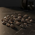 Smoky Quartz tumblestones on dark background